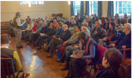 Image taken from the event of a room filled with attendants